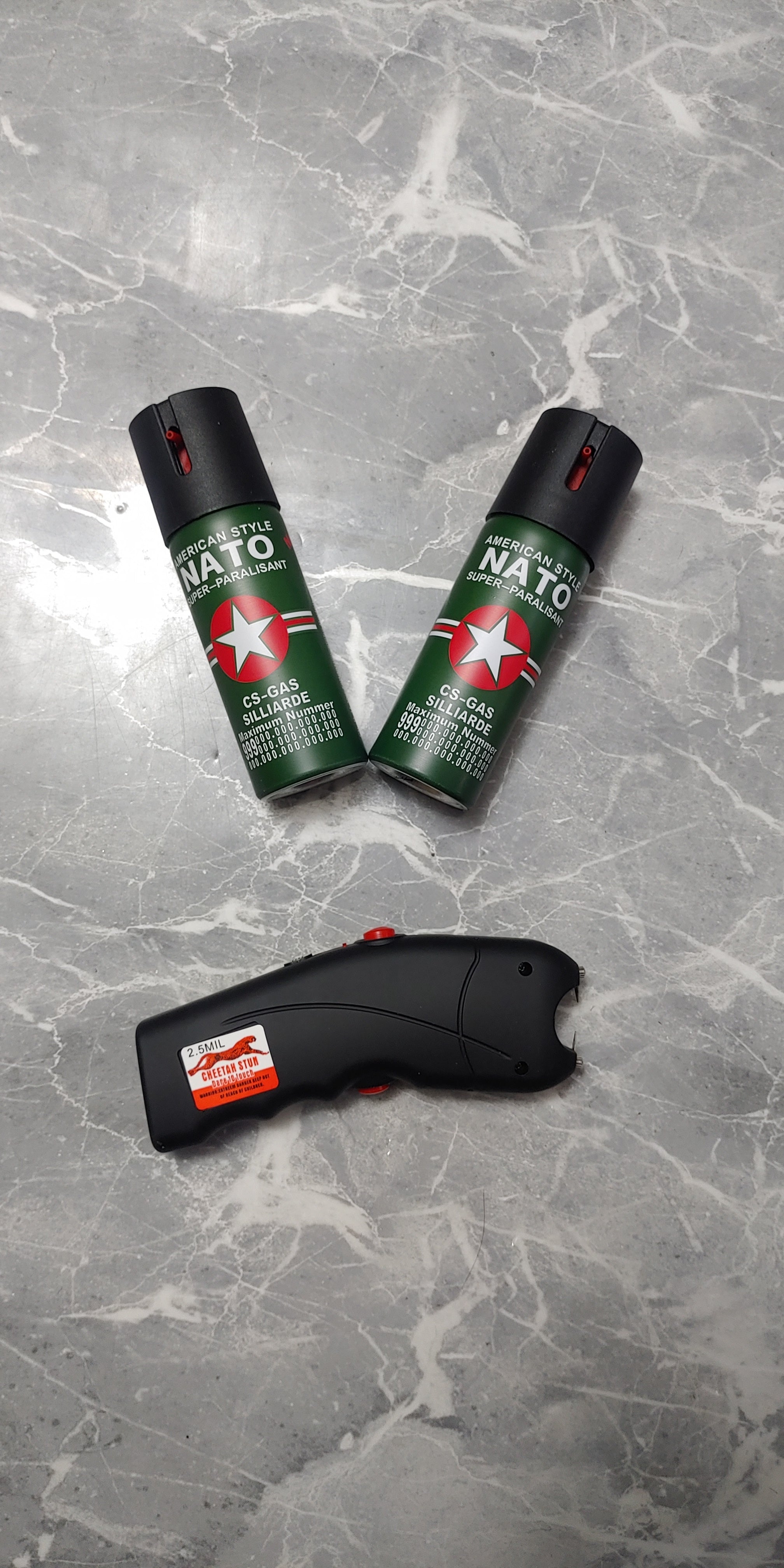 Linterna taser + 2 Gas pimienta