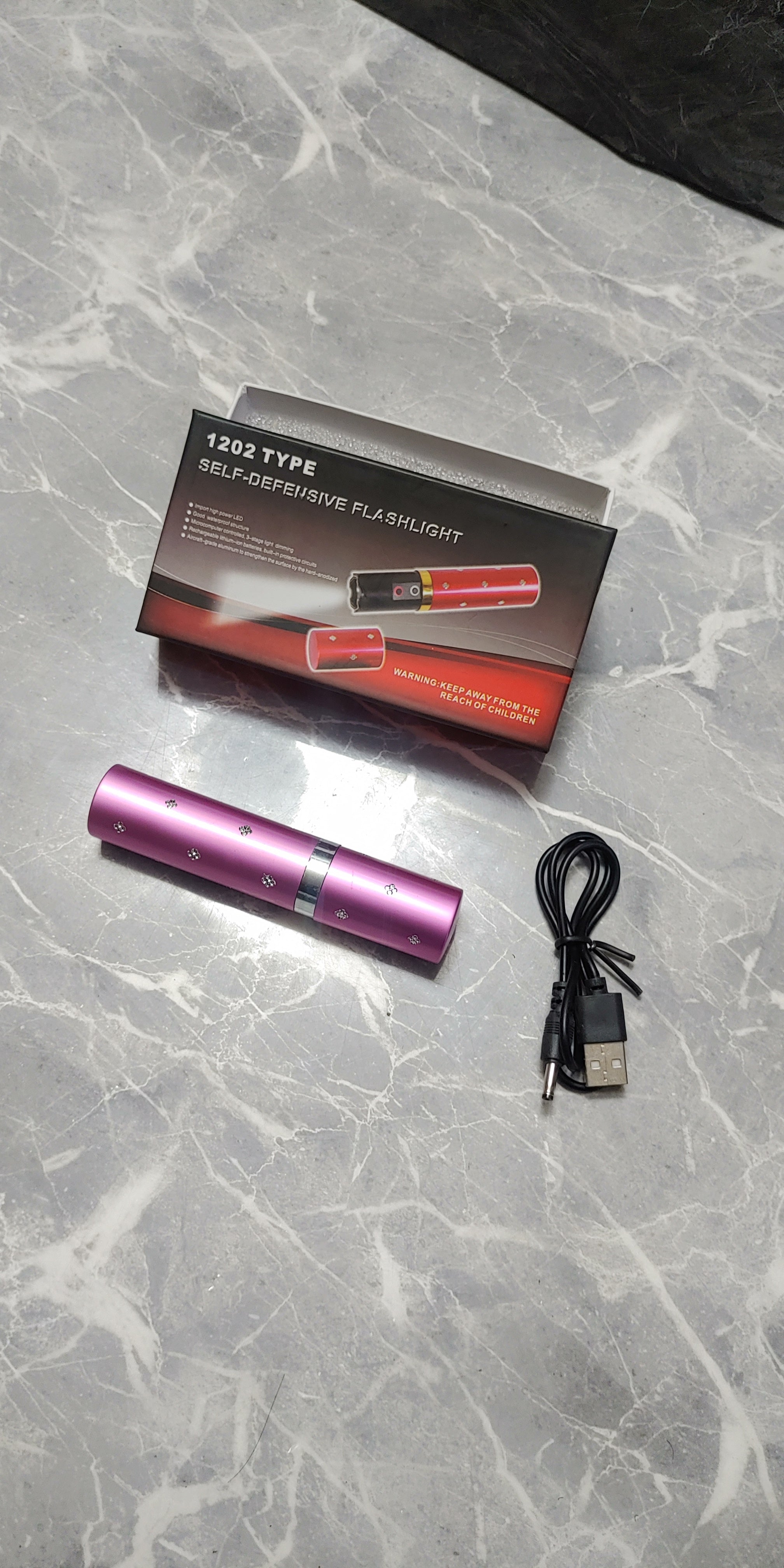 Linterna Taser – Modo Labial Oculto 1.1 kV