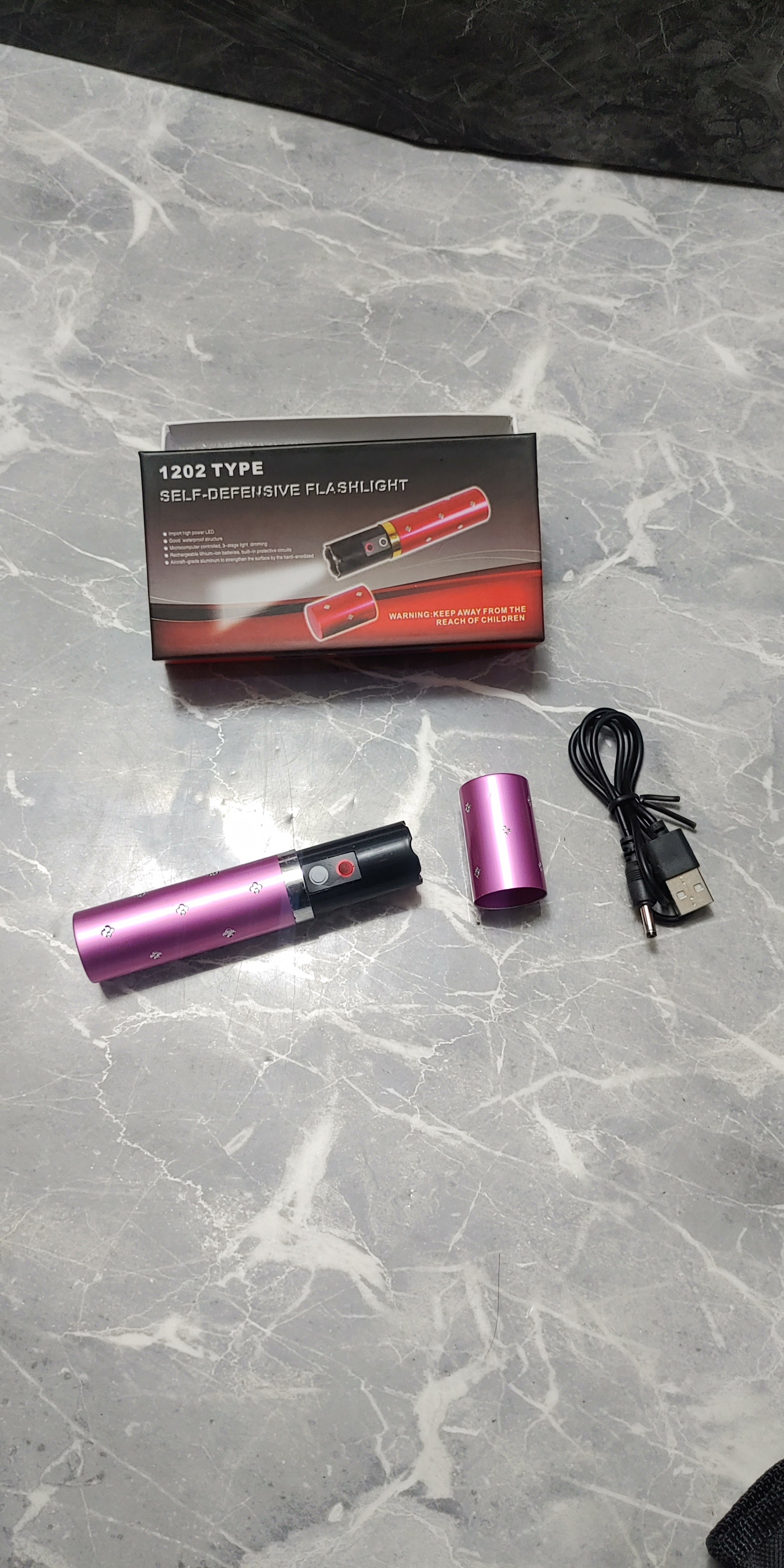 Linterna Taser – Modo Labial Oculto 1.1 kV